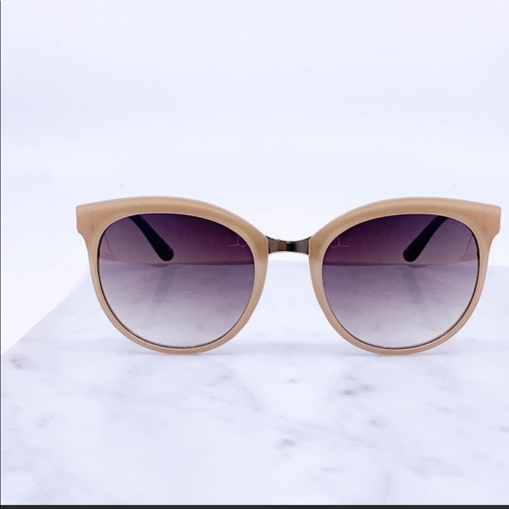 Cream Round trendy fashion sunglasses. Minor hairline scratches due to wear.